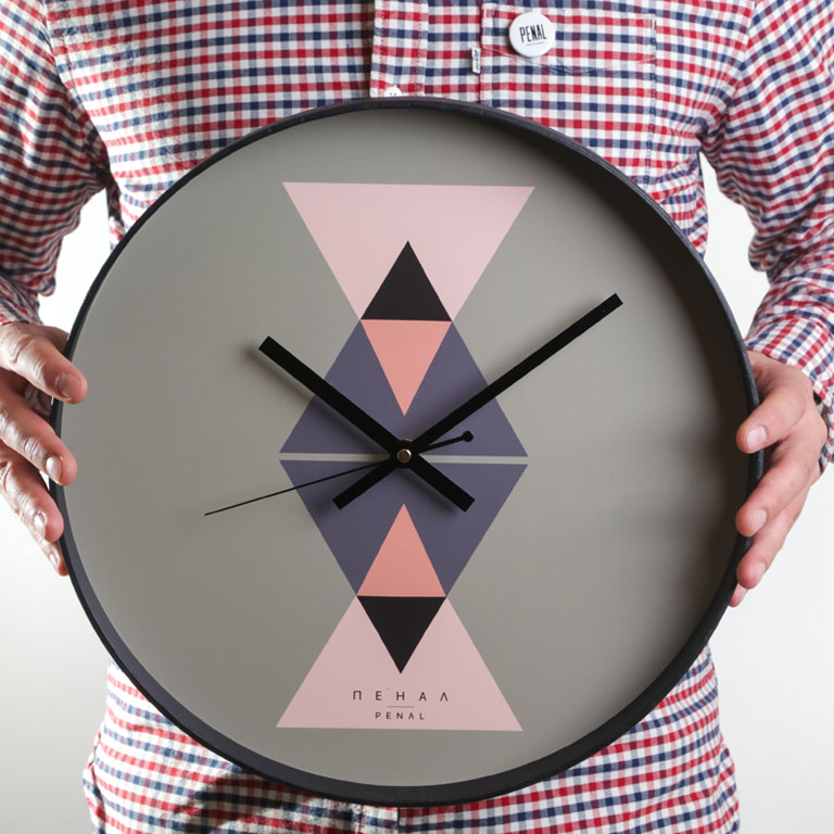 Arrow - large, modern wall clock, close up view from the hand