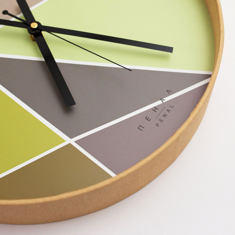 Close, side view of an Avocado wall clock