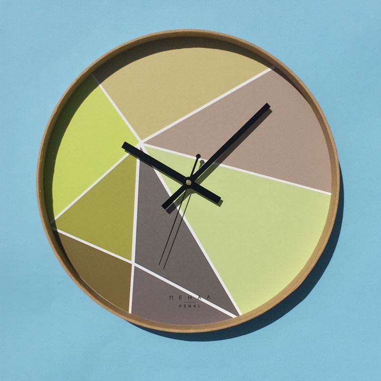 Avocados - large, modern wall clock hanging on the blue wall