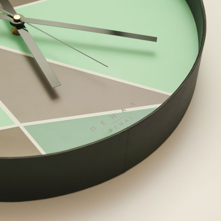 Close, side view of an Beyond The Compass wall clock