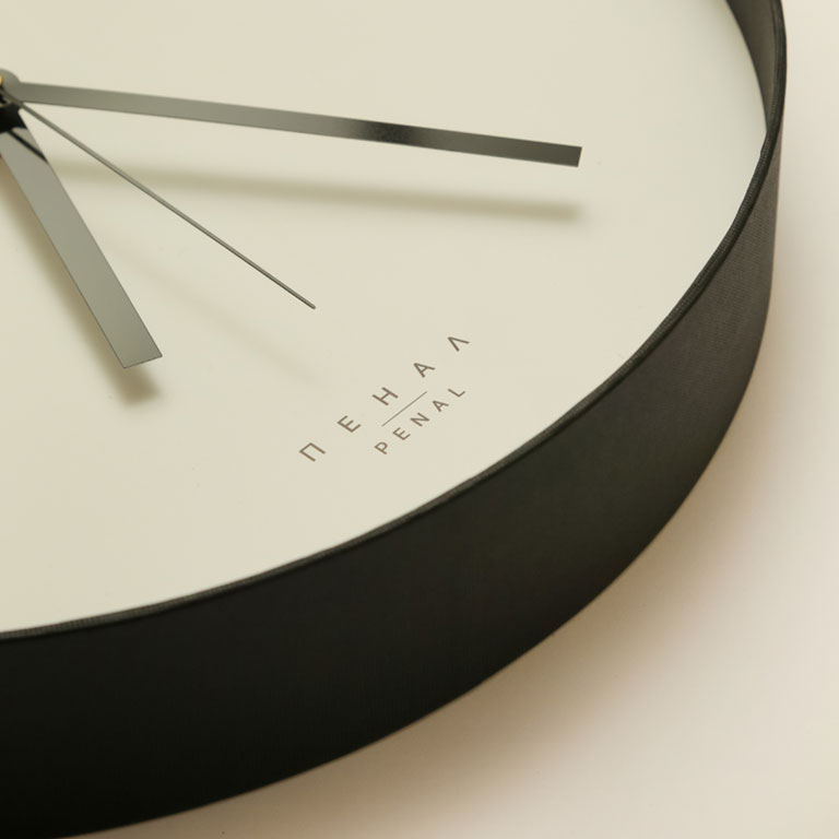 Close, side view of an Black and White wall clock