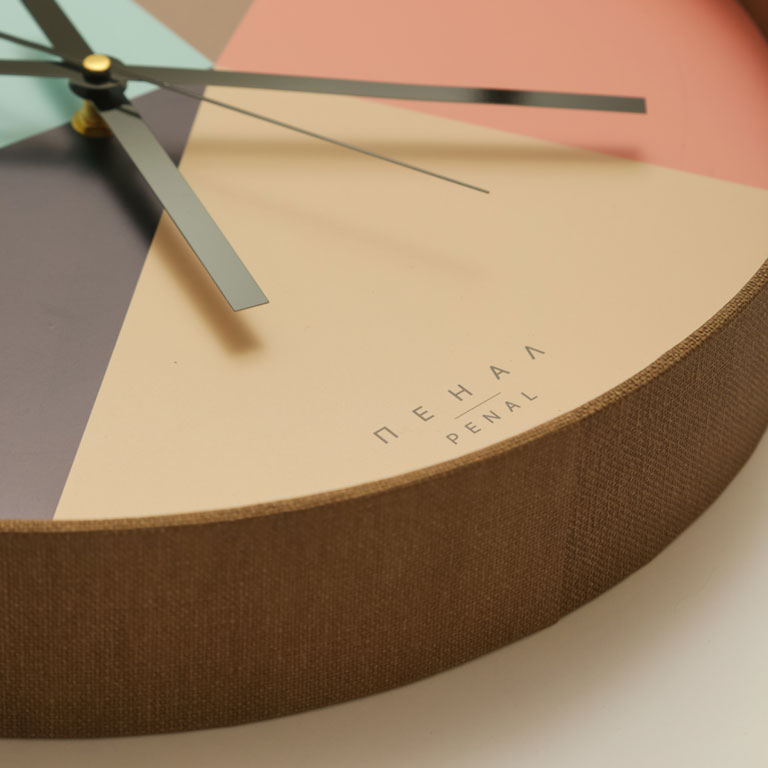 Close, side view of a Cozy Living wall clock