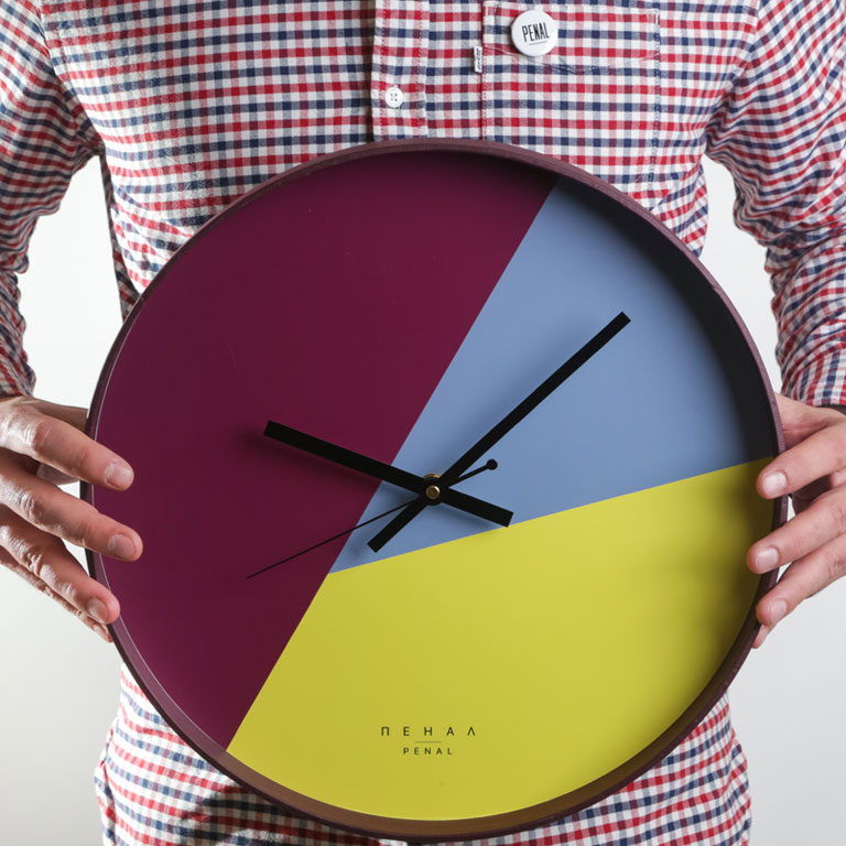 Funky - large, modern wall clock, close up view from the hand