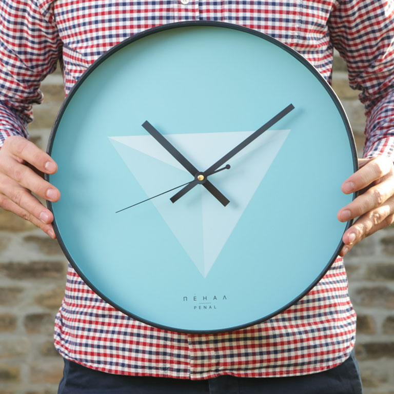 Pilot - large, modern wall clock, close up view from the hand