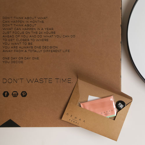 The Black and White wall clock with a stylish cardboard gift case and a gift