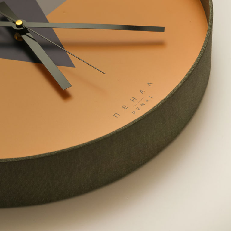 Close, side view of The Great Grey wall clock