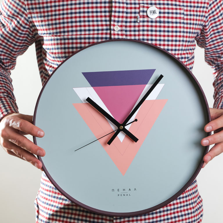 Victory - large, modern wall clock, close up view from the hand
